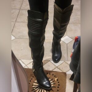 Black Knee-High Leather Boots with Gold Zippers